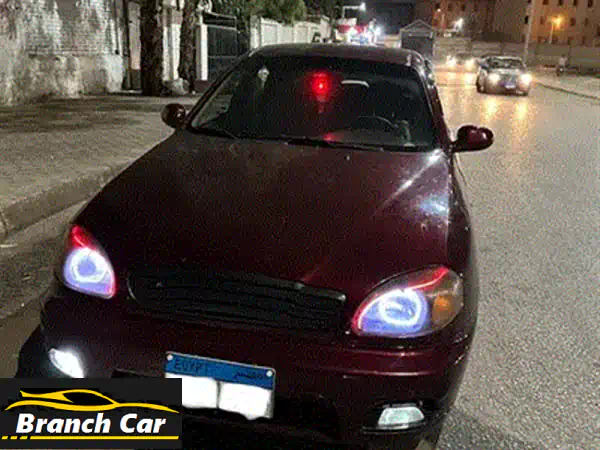 فرصة ذهبية: شيفروليه لانوس 2014 فابريكا بالكامل (ما عدا أكصدامين) | أزرق كحلي - شاشة أندرويد وكاميرا 360 وجنوط سبور