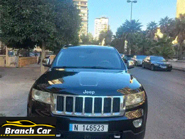 جيب جراند شيروكي 2011 V8 HEMI أوفرلاند أسود - فخامة وقوة لا تُضاهى (110,000 كم)