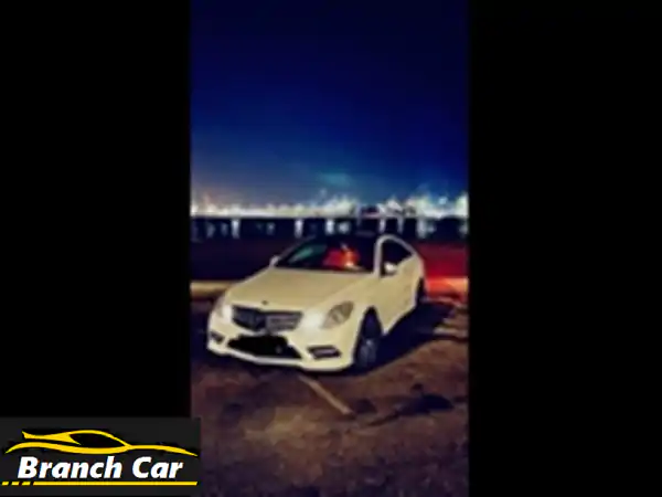 مرسيدس E350 كوبيه 2012 AMG بالرياض: فخامة وأداء رياضي (أبيض لؤلؤي/جلد أحمر) جاهزة للانطلاق!