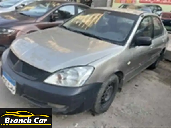امتلك الأسطورة: ميتسوبيشي لانسر بومة 2004 -...