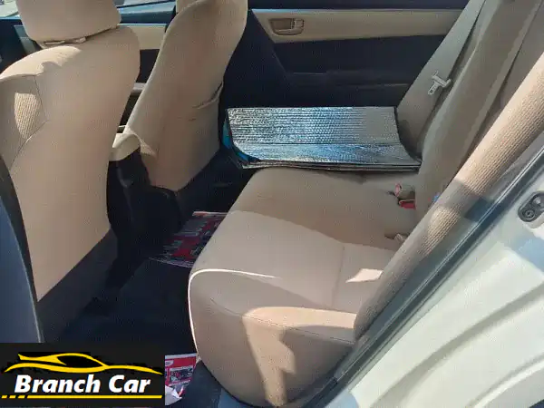 فرصة لا تعوض: تويوتا كورولا 2015 XLi 1.6L (أبيض) - بحالة ممتازة وجاهزة للانطلاق!