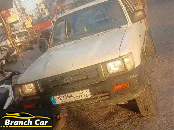تويوتا بيك اب 1995 أبيض: شاسي ذهب، قوة واعتمادية!...