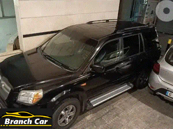 فرصة مميزة: هوندا بايلوت 2009 AWD للبيع - خالية من الحوادث، جاهزة لمغامراتك العائلية!
