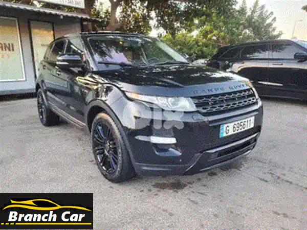 Range Rover Evoque Dynamic 2013 بيضاء للبيع - فخامة، أمان، وأداء لا يُضاهى!