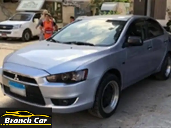 ميتسوبيشي لانسر EX شارك 2014: فابريكة، رخصة سنة...