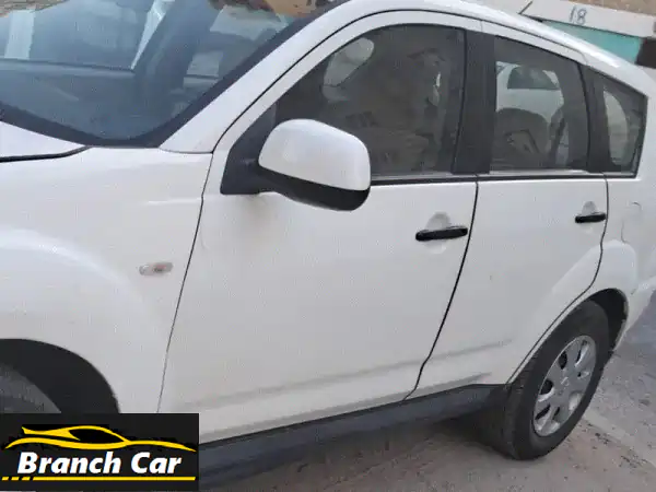 ميتسوبيشي أوتلاندر 2012 GLS بيضاء - سيارة عائلية...