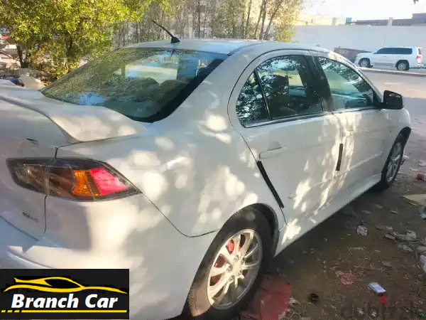 ميتسوبيشي لانسر GLX 2012 مستعملة - بيضاء بحالة ممتازة | وسادة هوائية للسائق