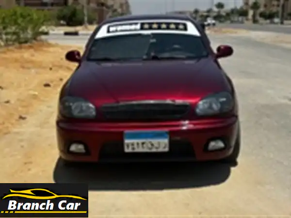 شيفروليه لانوس 2016: أناقة Dark Candy Red وروح رياضية -...