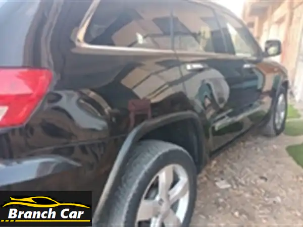 جيب جراند شيروكي 203 الفاخرة: أعلى فئة، بانوراما، أمريكية كاملة التجهيزات