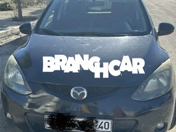 فرصة مزاد لا تفوت: مازدا 2 كليما 2009 – سيارة عملية بحالة ممتازة (65,000)