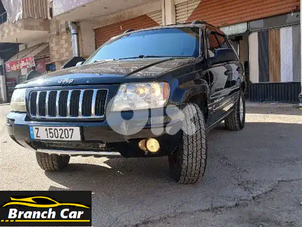 جيب شيروكي 2004 أسود: حالة المصنع من المالك الأول -...