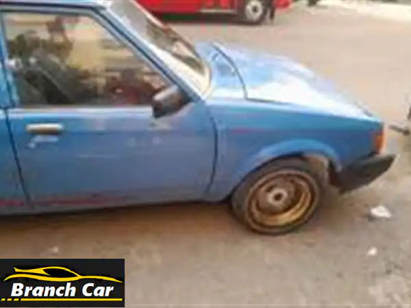 فرصة سفر: مازدا 323 للبيع بحدائق القبة! تحتاج عفشة وسمكرة بسيطة - رخصة سارية لأكثر من سنتين!