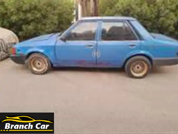 فرصة سفر: مازدا 323 للبيع بحدائق القبة! تحتاج...