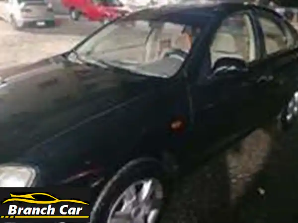 فرصة ذهبية: نيسان صني N16 بيتي فابريكا سقف وكبوت - حالة ممتازة للبيع!