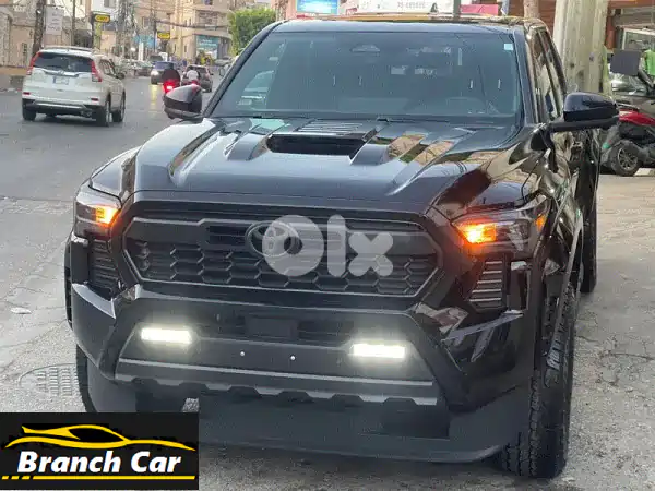 تويوتا تاكوما 2024 سوداء دبل كاب 4x4 - بحالة...