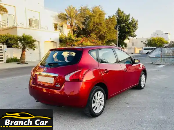 فرصة لا تعوض! نيسان تيدا 1.6L حمراء 2014 بحالة ممتازة - تأمين وفحص حتى 2026!