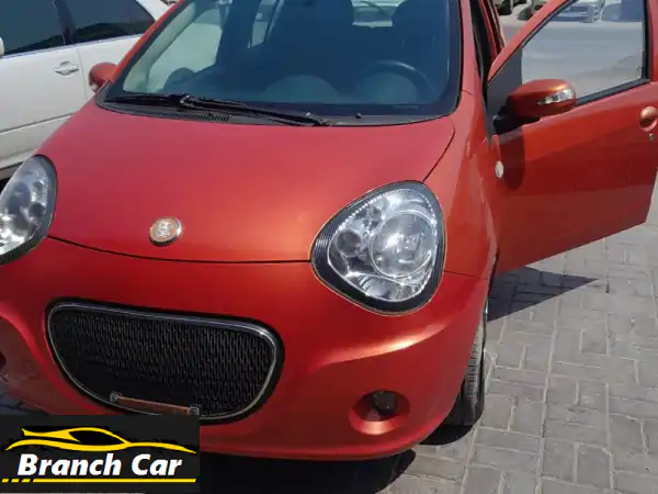 فرصة ذهبية: جيلي باندا 2012 هاتشباك برتقالية - ممشى قليل جداً (11 ألف كم) بحالة الوكالة في عجمان!