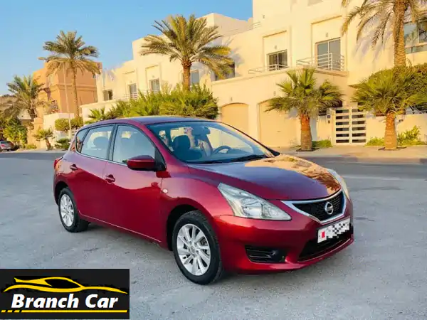 فرصة لا تعوض! نيسان تيدا 1.6L حمراء 2014 بحالة ممتازة...