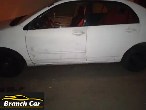 تويوتا كورولا 2002 بيضاء GL: اعتمادية وسعر مميز (6000 ريال)! جير عادي ومكيف بارد