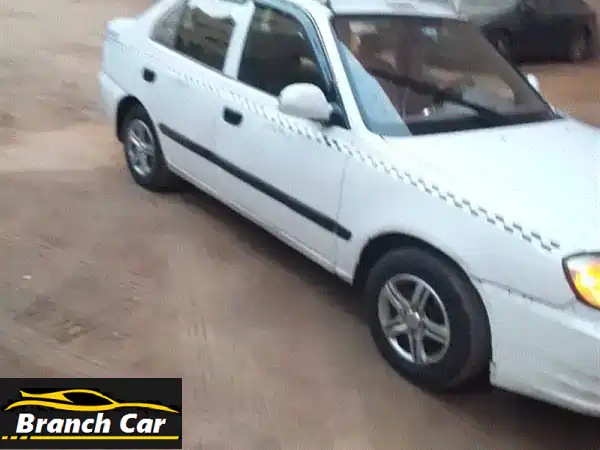 هيونداي فيرنا تاكسي 2013 أبيض: رخصة سنة، جاهزة للشغل...