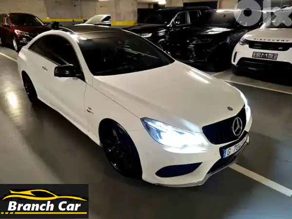 مرسيدس E400 كوبيه 2014 بيضاء توين تيربو V6: رفاهية...