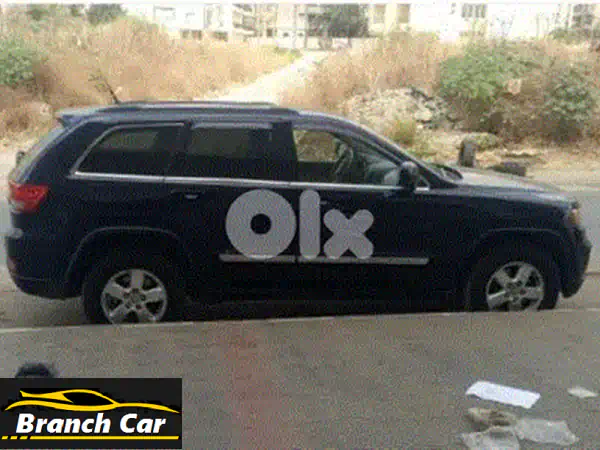 جيب جراند شيروكي 2015 بيضاء للبيع في طرابلس، لبنان - 4x4 بحالة ممتازة وفحص جاهز!