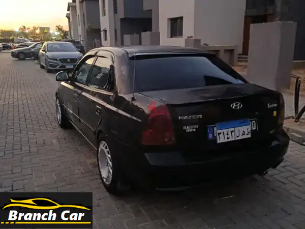 هيونداي فيرنا 2004 بحالة الزيرو: قيادة ممتعة وتوفير...