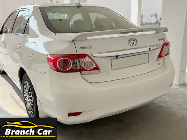 امتلك تويوتا كورولا XLI 2013 بيضاء: حالة ممتازة،...