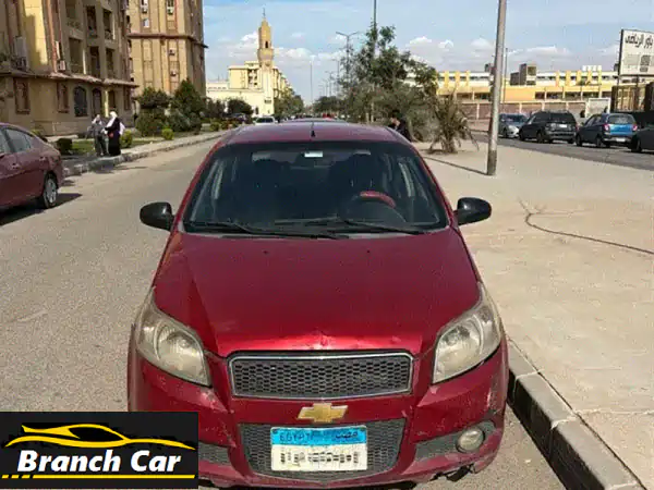 للبيع: شيفروليه افيو 2009 حمراء - فبريكا بالكامل...