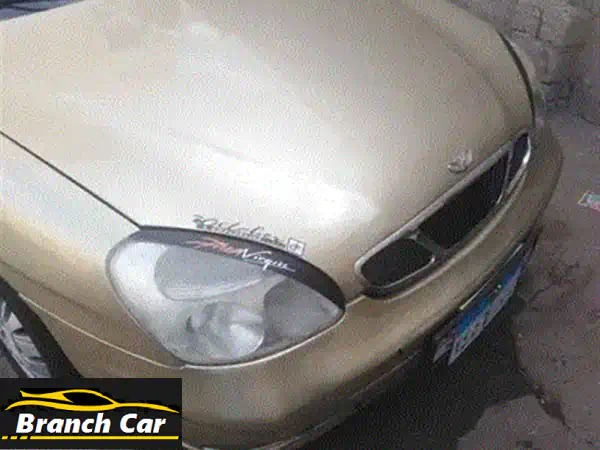 دايو نوبيرا 1999 ذهبية ✨ بحالة ممتازة!  (داخل فبريك، تكييف، ثلاجة، رخصة 3 سنوات)
