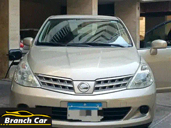 فرصة ذهبية! نيسان تيدا 2007 بيضاء بحالة ممتازة - للبيع بداعي السفر!