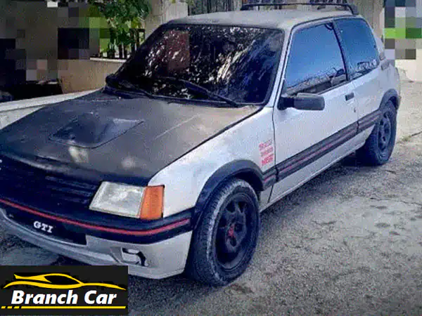بيجو 205 GTI 1989 - قطعة نادرة من الماضي تعود للحياة!...