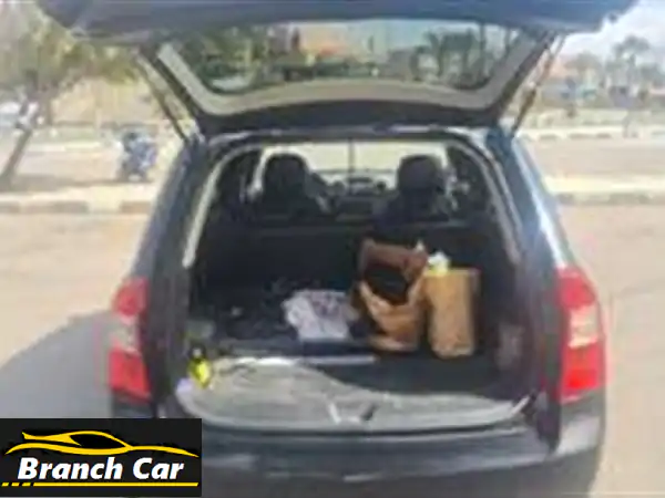 كيا كارينز 2010 بحالة ممتازة! رشيقة، اقتصادية، وعائلية - فرصة لا تُفوّت!