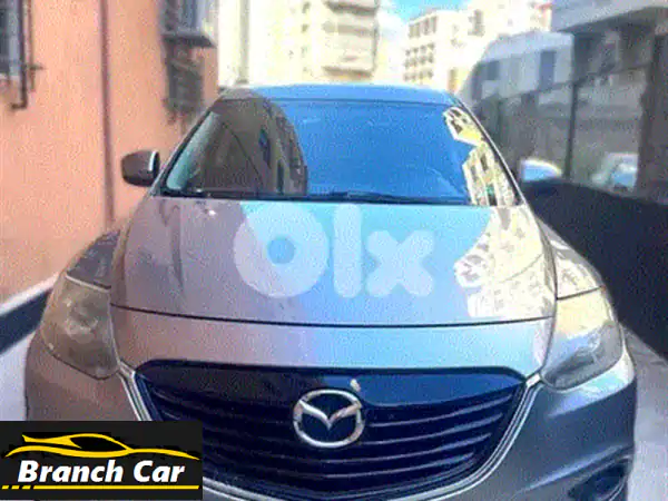 مازدا CX-9 2015 للبيع: SUV عائلية سوداء بحالة ممتازة بـ 12,000$ فقط!