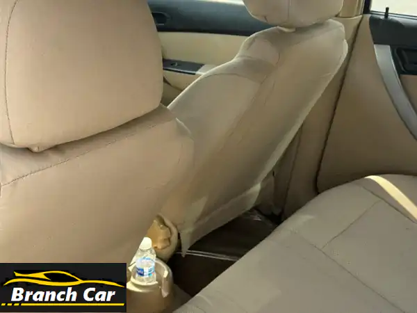 فرصة ذهبية! شفروليه أفيو 2014 بيضاء - تأمين ساري حتى 2026 | سيارة اقتصادية وموثوقة بالبحرين