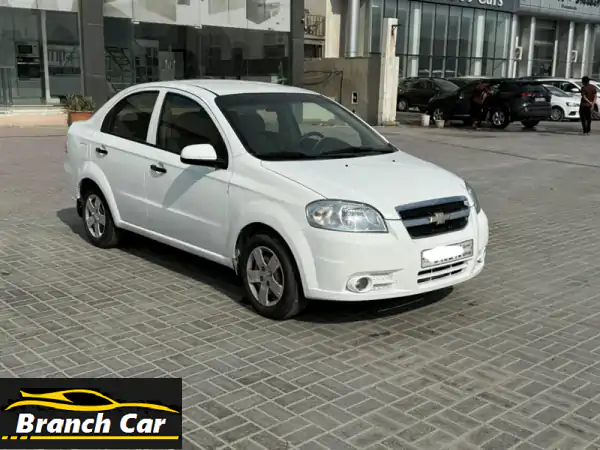 فرصة ذهبية! شفروليه أفيو 2014 بيضاء - تأمين ساري حتى 2026...