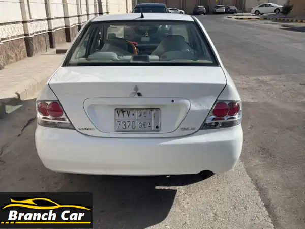 فرصة ذهبية: ميتسوبيشي لانسر بومة 2009 – وكالة بالكامل وبحالة استثنائية!