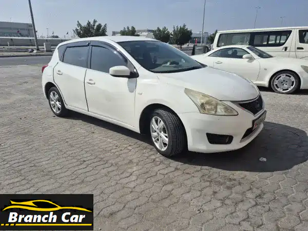 نيسان تيدا 2014 أبيض: صيانة ممتازة، داخلية نظيفة، وسائد هوائية - جاهزة للانطلاق!