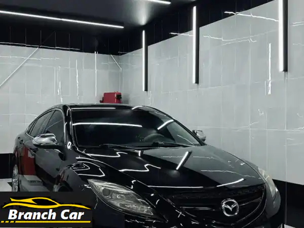 فرصة ذهبية: مازدا نظيفة جداً للبيع في أبوظبي بسعر 13,000 درهم! جاهزة للانطلاق.