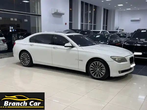 استمتع بالفخامة: BMW 750Li 2009 أبيض - كامل المواصفات | أداء...