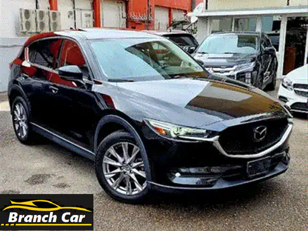 مازدا CX-5 2022 AWD بريميوم بلس: الجديدة كلياً بمواصفات CX-9 الفاخرة! فخامة وأداء لا يُضاهى