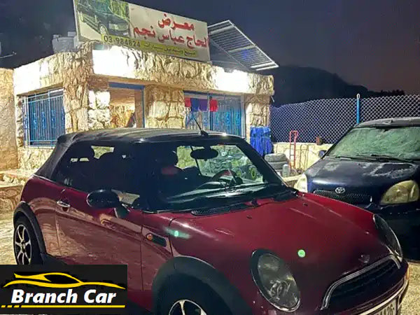 انطلق بأناقة! 🚀 ميني كوبر 2005 للبيع: قيادة ممتعة...