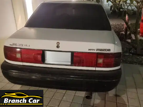 مازدا 323 كلاسيكية 1994: سحر الماضي بين يديك! (حالة ممتازة للبيع)