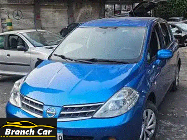 فرصة ذهبية: نيسان تيدا 2009 يابانية - مالك واحد، 98 ألف...