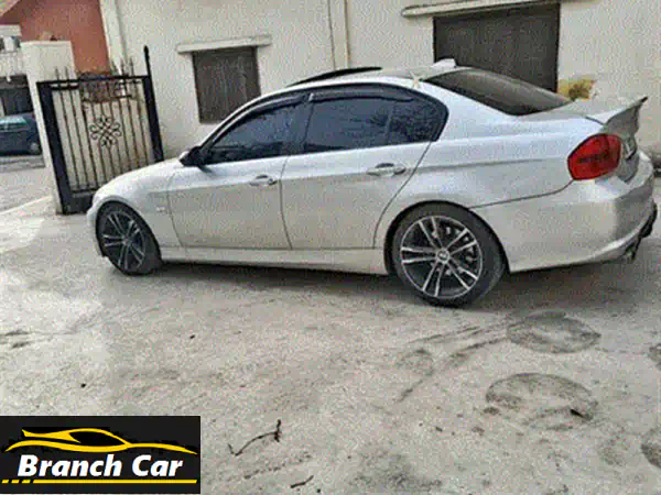 BMW E90 330i M-Tech 2006: الأداء الرياضي والفخامة السوداء (بحالة استثنائية)