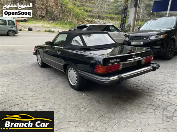 أيقونة الأناقة: مرسيدس SL 560 كشف 1988 | أسود بيج | الضنية - فرصة لا تعوض!