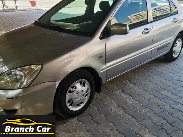 سيارة للبيع: ميتسوبيشي لانسر موديل 2010، اللون فضي، الممشى حوالي 300,000 كيلومتر  بحالة جيدة  ...
