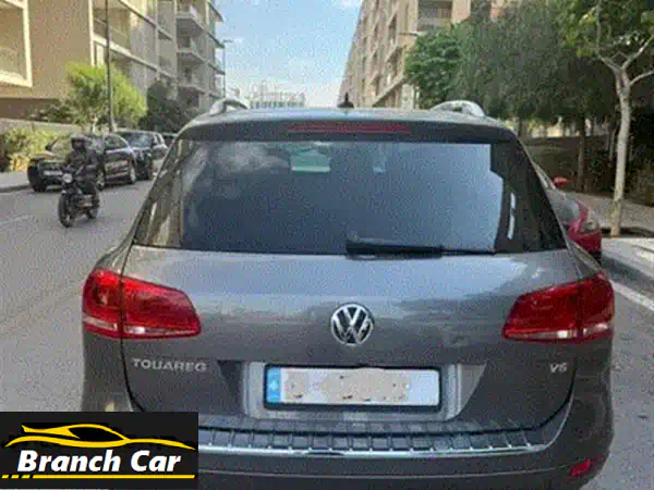 فولكس فاجن طوارق 2012: قيادة استثنائية من مصدر شركة موثوق | الأمان والفخامة بين يديك!