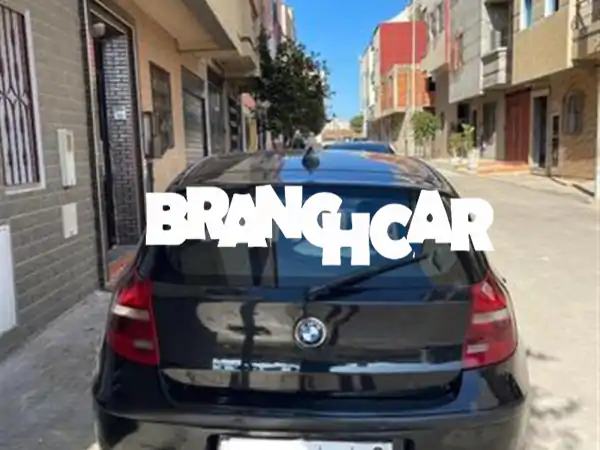 فرصة ذهبية: BMW الفئة الأولى 2012 | 5 أبواب، ناقل يدوي | قيادة متعة بسعر 92,000!