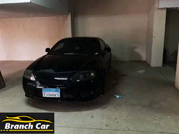فرصة ذهبية: هيونداي كوبيه 2005 (Hyundai Coupe) خليجي بحالة الزيرو | Apple CarPlay ورفاهية لا تُضاهى!